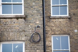Sliding sash window installation - brick wall - white window frame