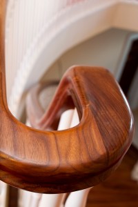 Continuous walnut handrail - Walnut | Lacquer | Continuous Handrail | Swan's Neck | 180 Degree Bend | Photo by Kevin McFeely