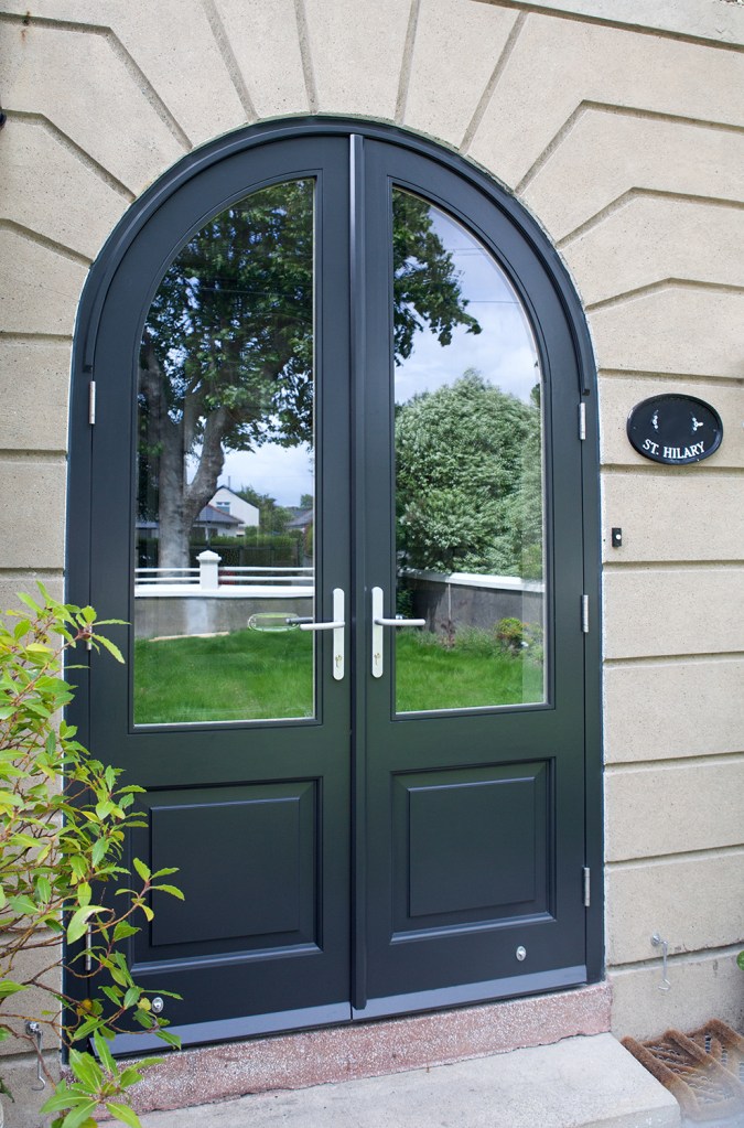 Arched front entrance doors - Arched Doors | 57mm Thick | Accoya | Insulated Raised and Fielded Panels | RAL 7021 Black | RAL 9010 White | Clear Glass | Dual Colour | Stainless Steel Ball Bearing Hinges