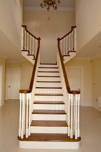 Walnut and cream staircase with walnut tread and white wood baluster