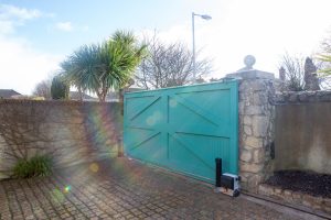 Turquoise motorized gate