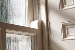 Sliding sash bathroom window with cotswold glass - white frame and casing