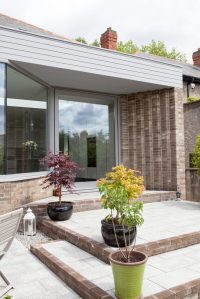 Glass pivot door - view from extended porch