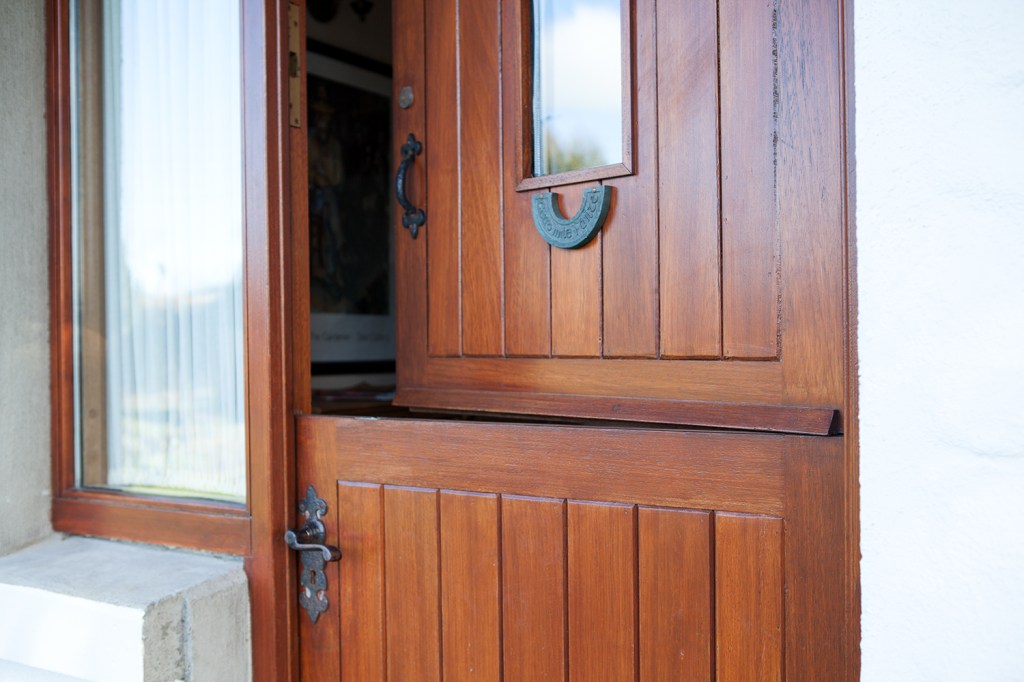 Dutch door - iron door handle - sidelite window - double door
