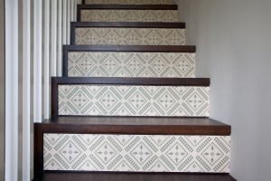 detailed staircase riser with dark wood trim and frame - dark wood tread - white wooden staircase baluster