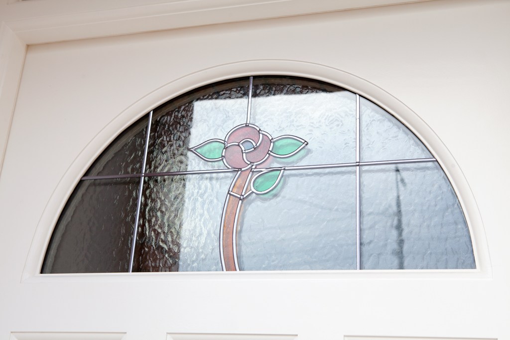 Transom stained glass door - arched stained glass - rose detail - rose stained glass - white door