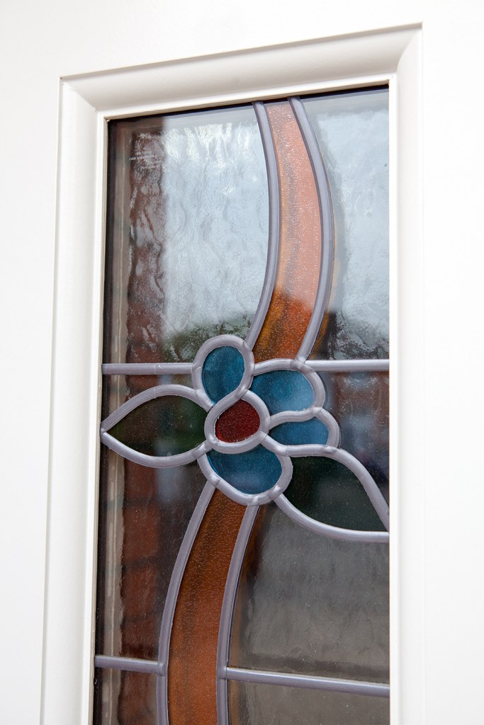 Detailed stained glass - flower stained glass - white door frame