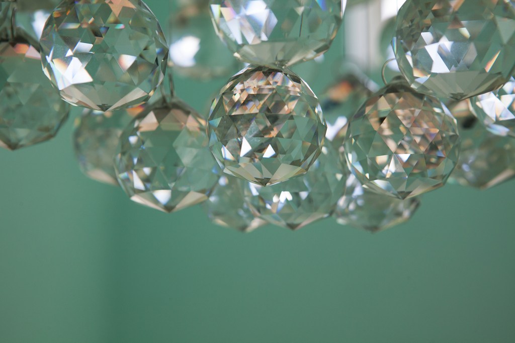 Close up photo of chandelier glass spheres - crystal balls
