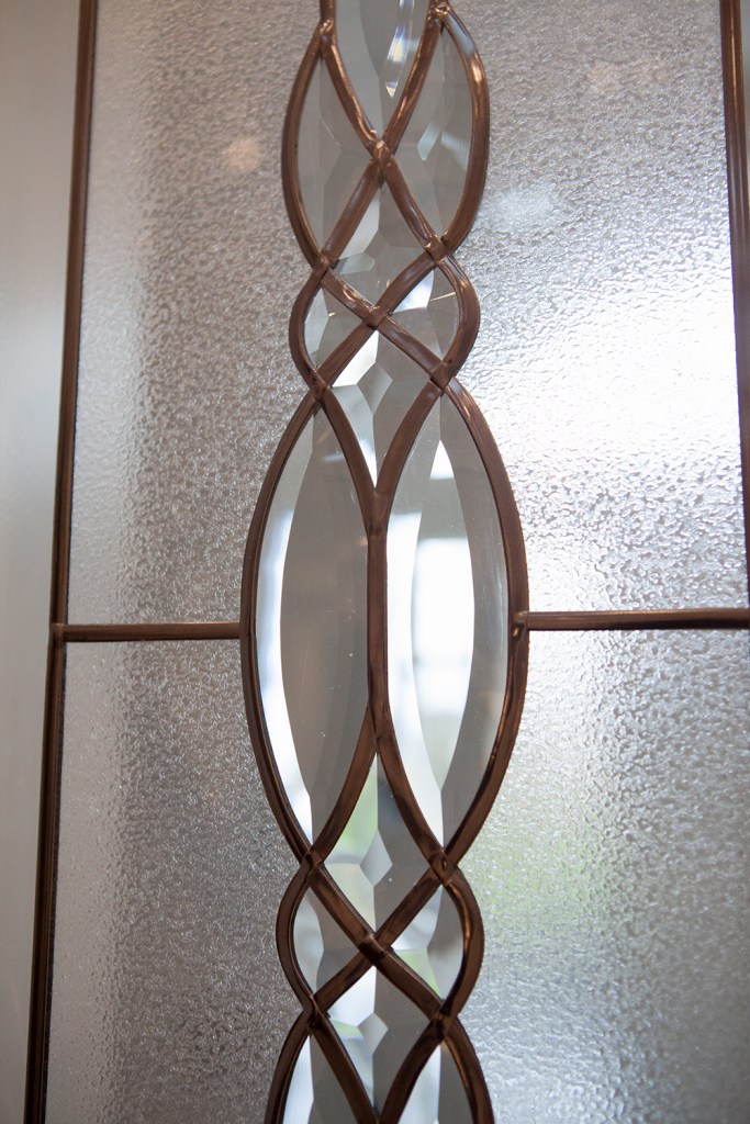 Curved grilles in stained glass detail