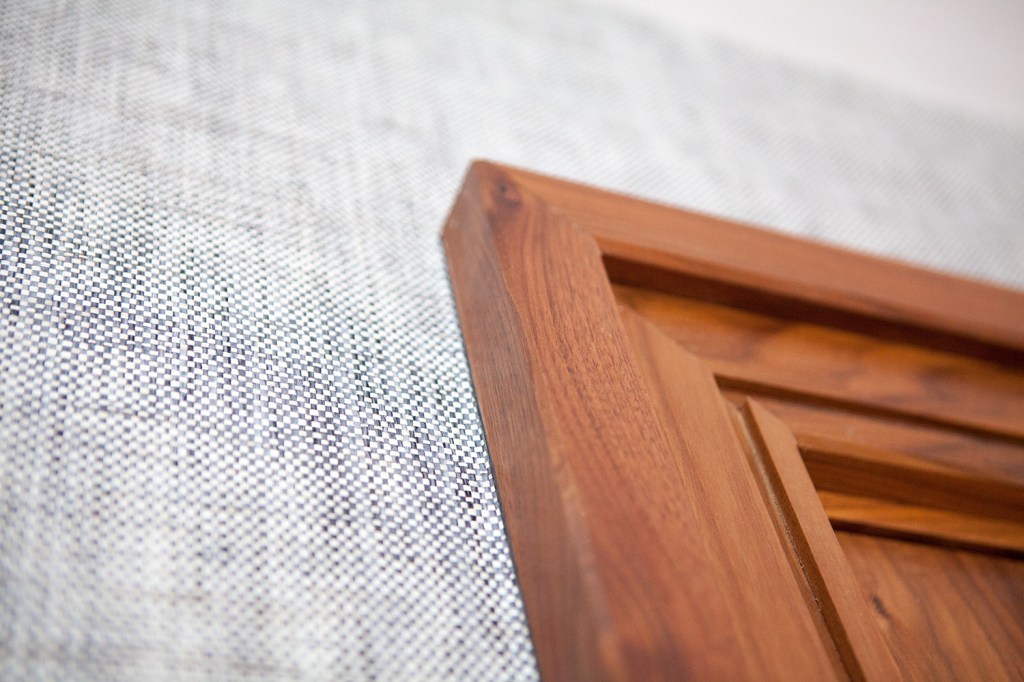 Wooden door frame close up - corner view - wooden door casing