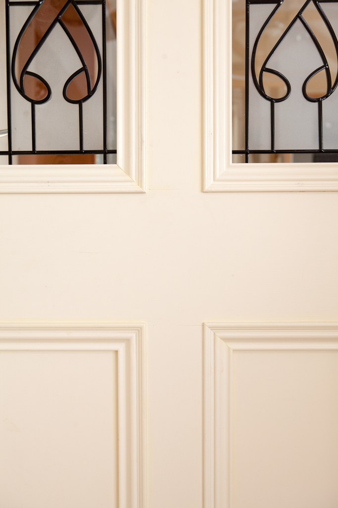 White door panel with white grille - stained glass panel inside door - white door panel frame
