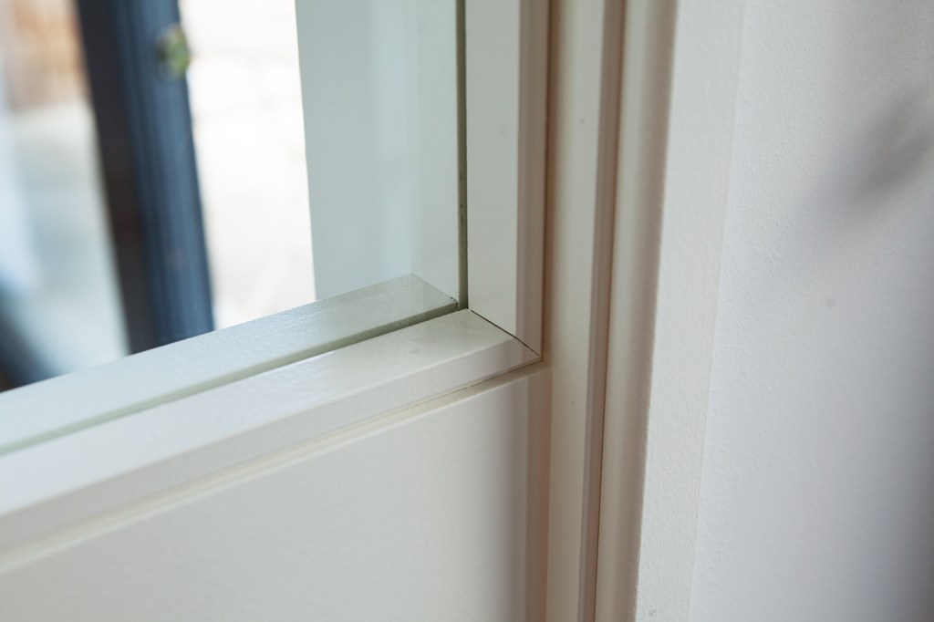 Transom door detail - corner of window - white frame