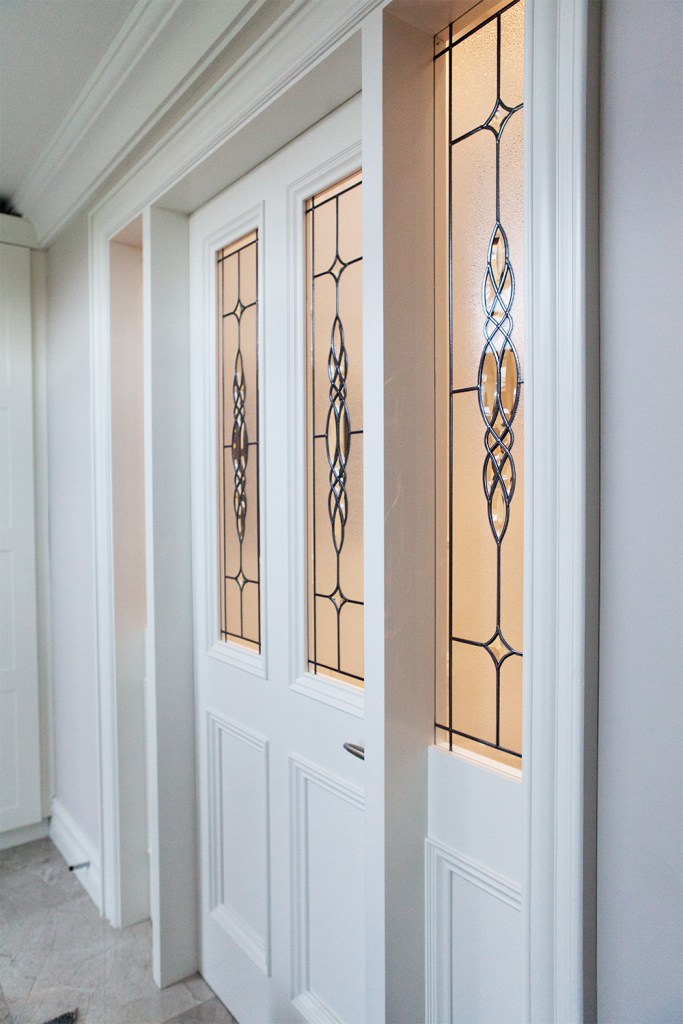 white transom doors - decorative windows in door - side view - white door frame