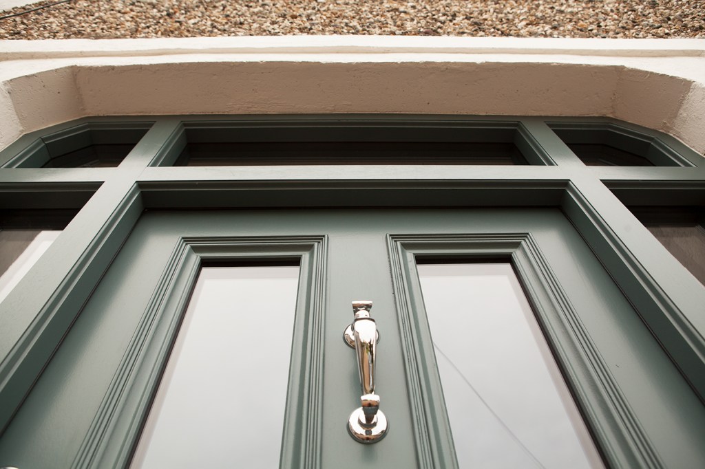 Door with window frame - silver door knocker - looking up - white frame - windows in door