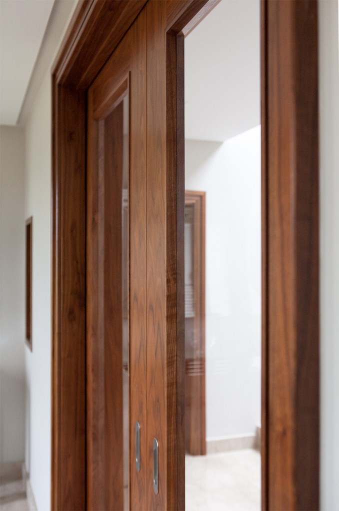 doorlight door - side view of closed sliding door - dark wood - stained wood - wood door frame