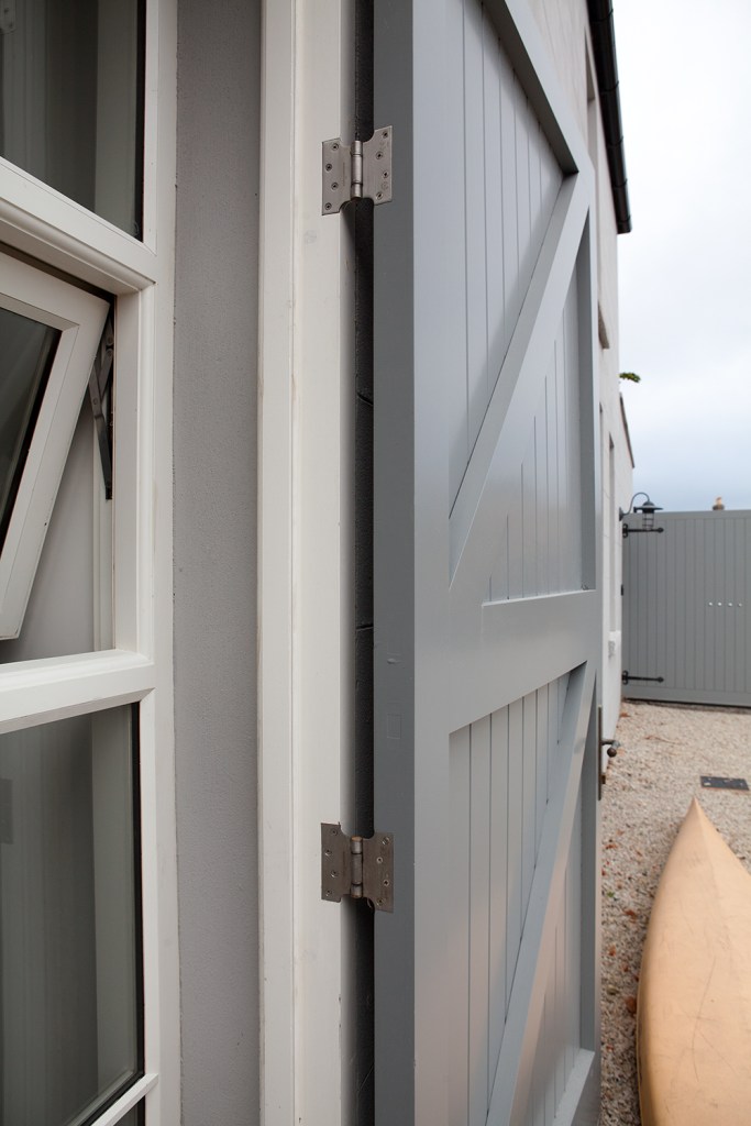 Double door hinge - grey door - tilt turn windows - white window frame