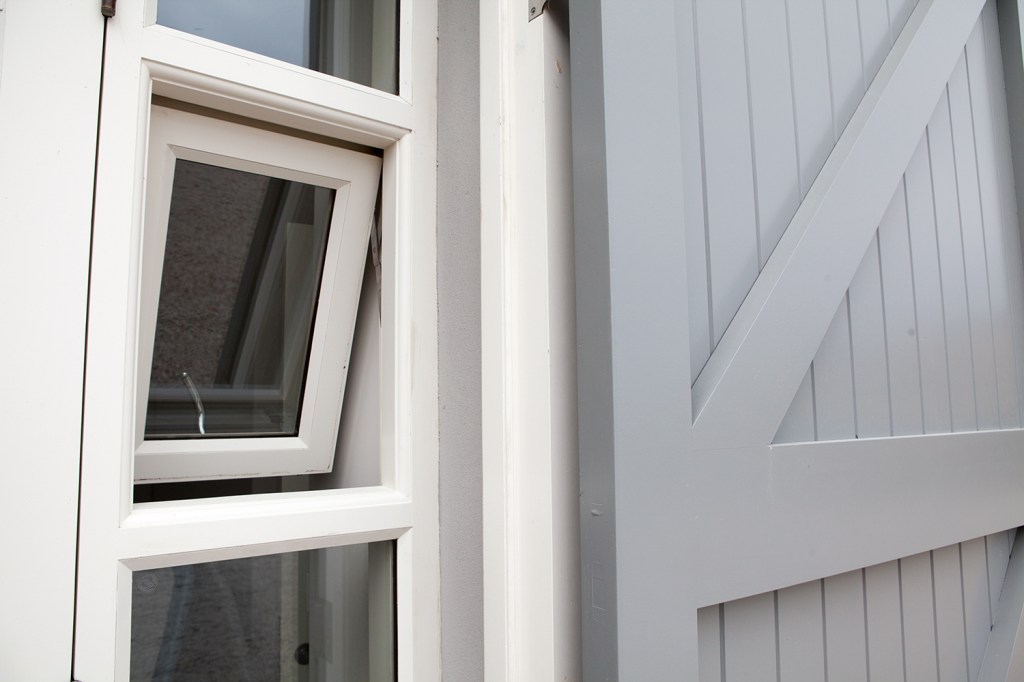 tilt turn windows - white window frame - grey outside door