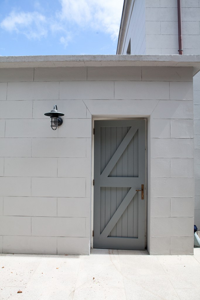 White house - back door - black lantern light - grey door