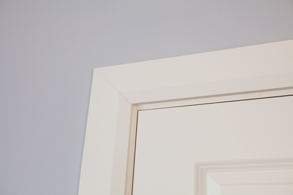 White door frame with white door