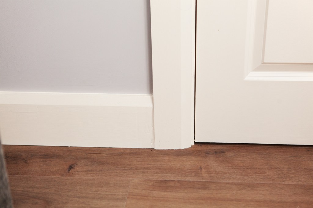 White trim - wood floor - white door