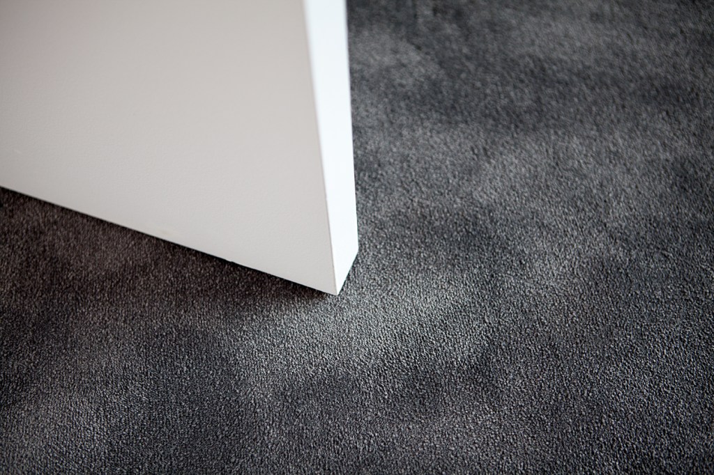 door bottom corner - open door - door clearance - dark floor