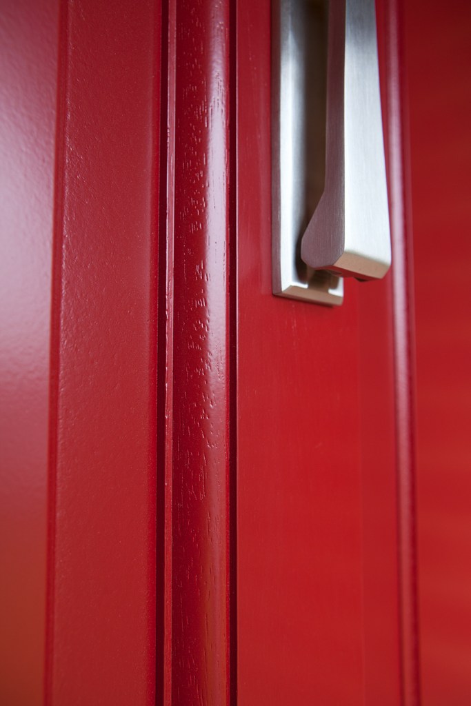 red door with aluminum door handle