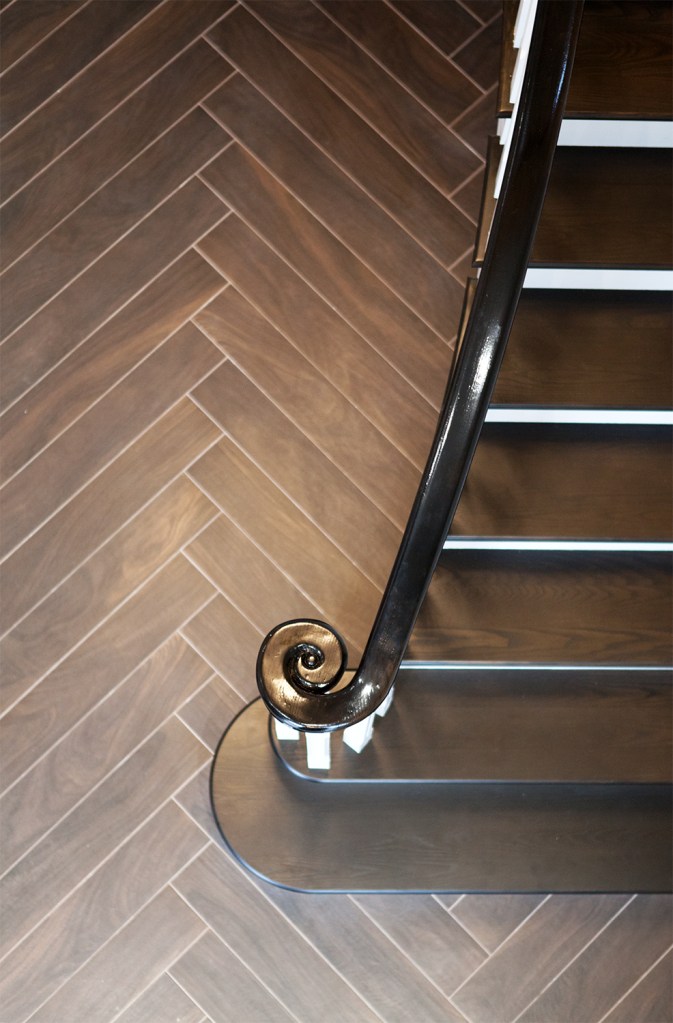 Staircase - curved newel handrail end - view from top - laminated floors - swirl end - staircase hand rail