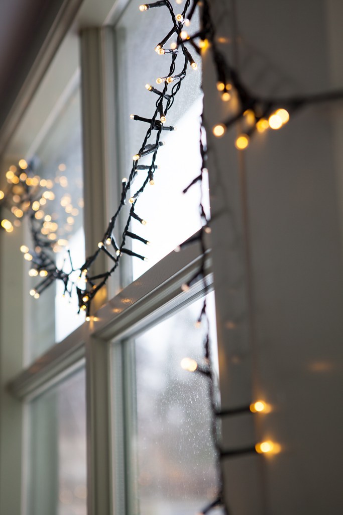 Hanging Christmas lights from window - window has grilles