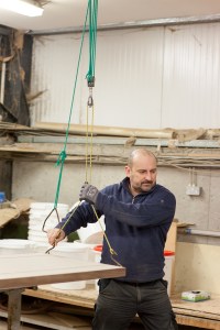 Man busy working with wooden pallet